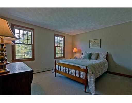 See the before photos of a classic New England Colonial with good bones that was built in the 1980s. These photos capture the home just before new owners and a massive renovation.