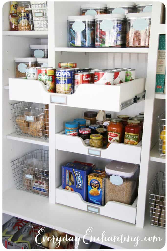 Pull out drawers of canned goods in pantry