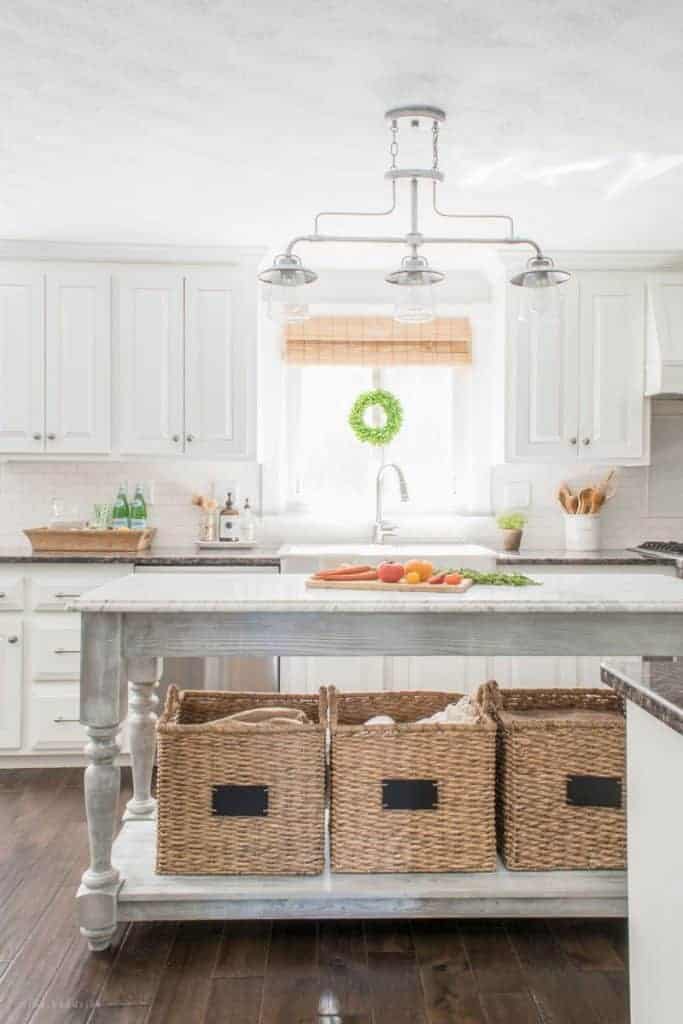 Add character to a white kitchen with wicker and other natural textures.