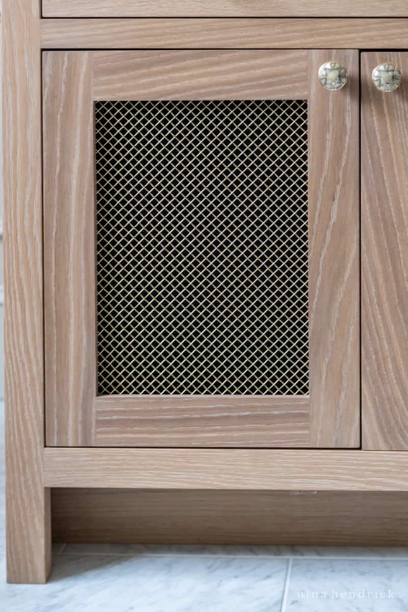 Bathroom vanity door with mesh inlay door panel design