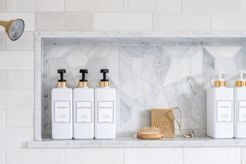 Bathroom shower niche with decanted soap storage idea