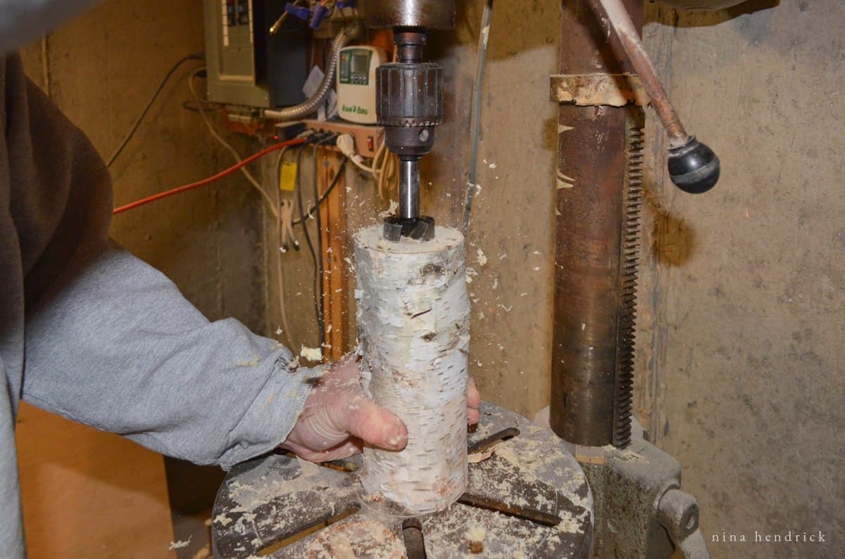 Drill a birch log candle holder with a forstner bit