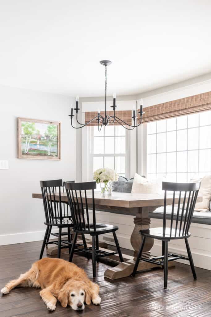 Family-friendly breakfast nook refresh with dark hardwoods and a trestle table