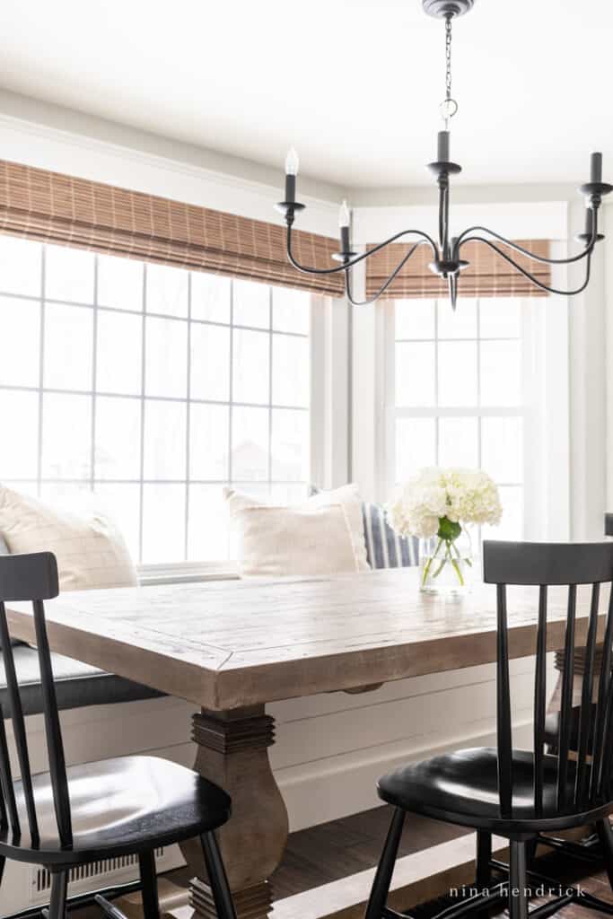 Breakfast nook refresh with trestle table and neutral pillows
