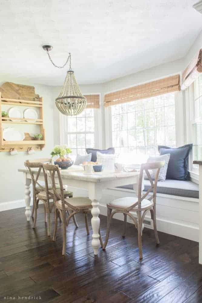 angle of breakfast nook with table and chairs