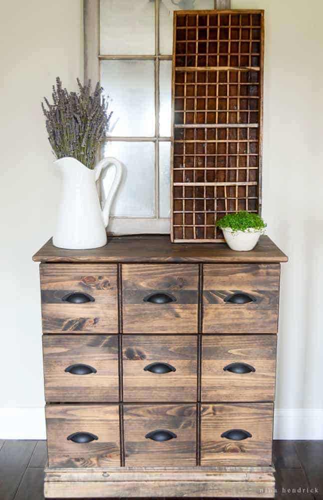 DIY Wood Dresser Card Catalog IKEA Hack Tutorial | See how you can easily and inexpensively get the look of an antique card catalog with this Wood Dresser Card Catalog IKEA Hack Tutorial. 