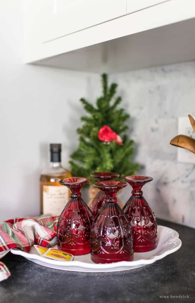 Hot toddy tray with tea and red goblets