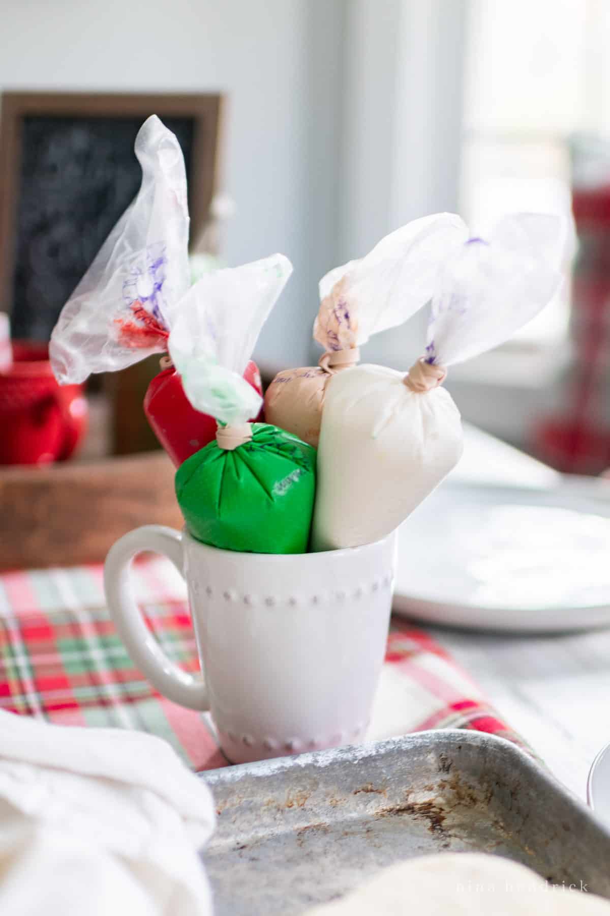 Red, Green, White, and Tan royal icing with a plaid tablecloth