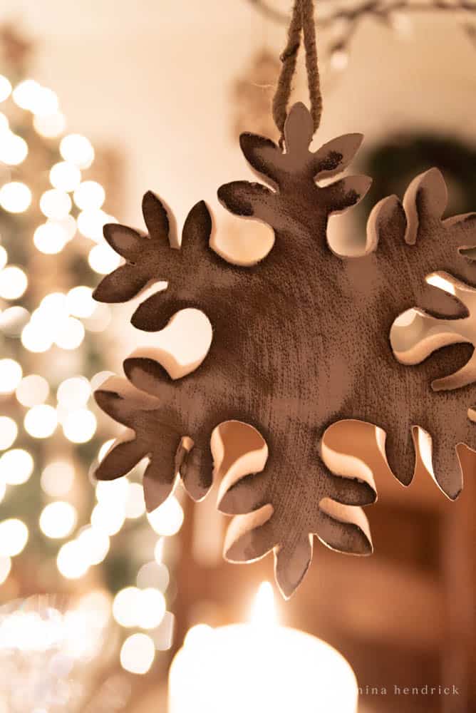 Snowflake ornament with christmas lights at night