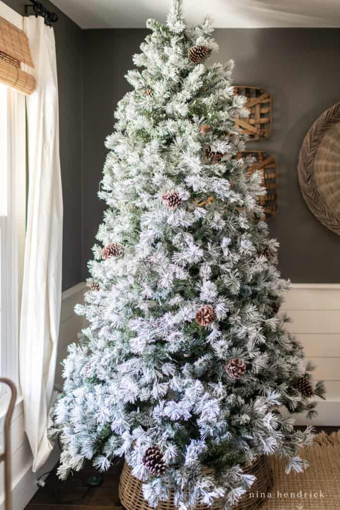 Undecorated artificial Christmas tree with flocking