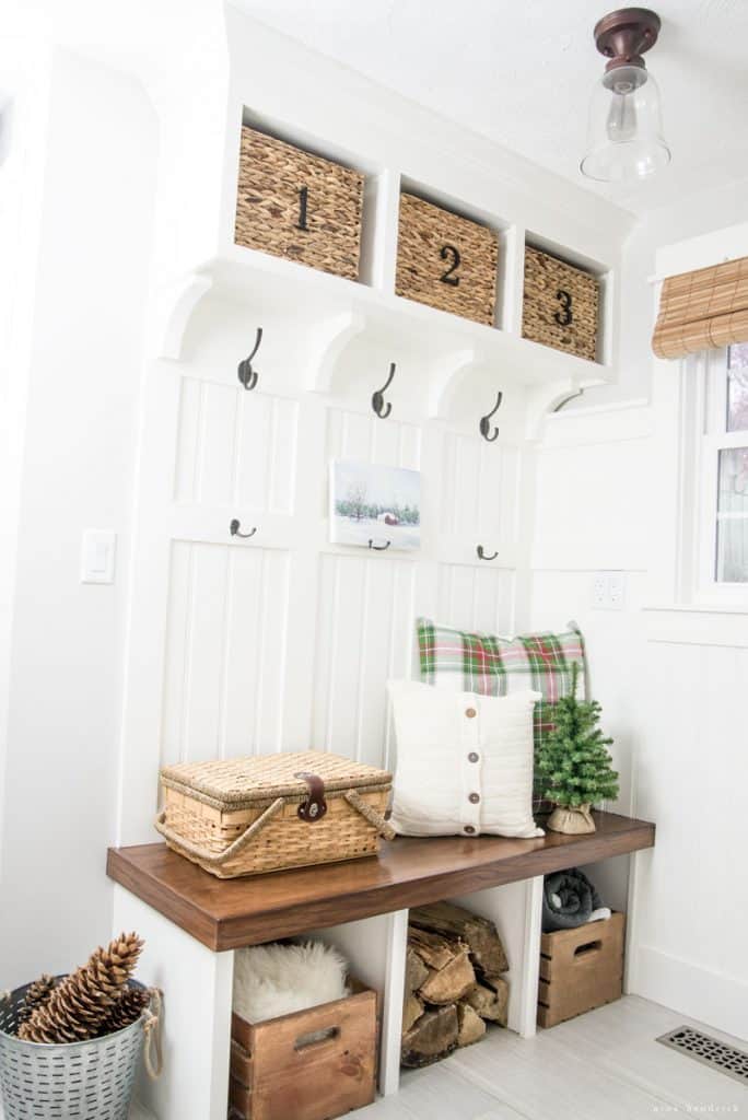 Mudroom built-ins decorated for Christmas with a New England and Robert Frost theme