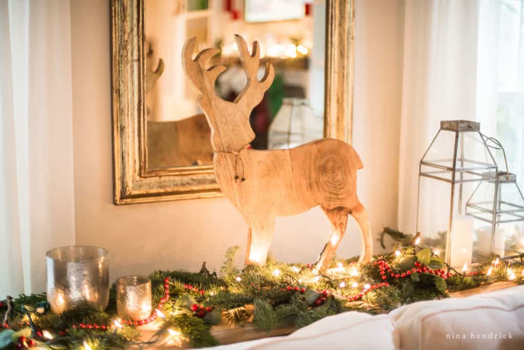 Wooden deer holiday vignette