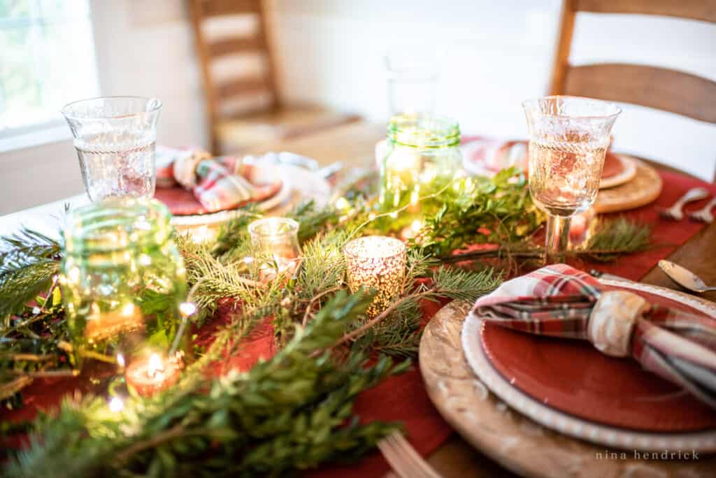 Gather inspiration for your holiday entertaining with this Classic Christmas Tablescape featuring traditional reds and greens.
