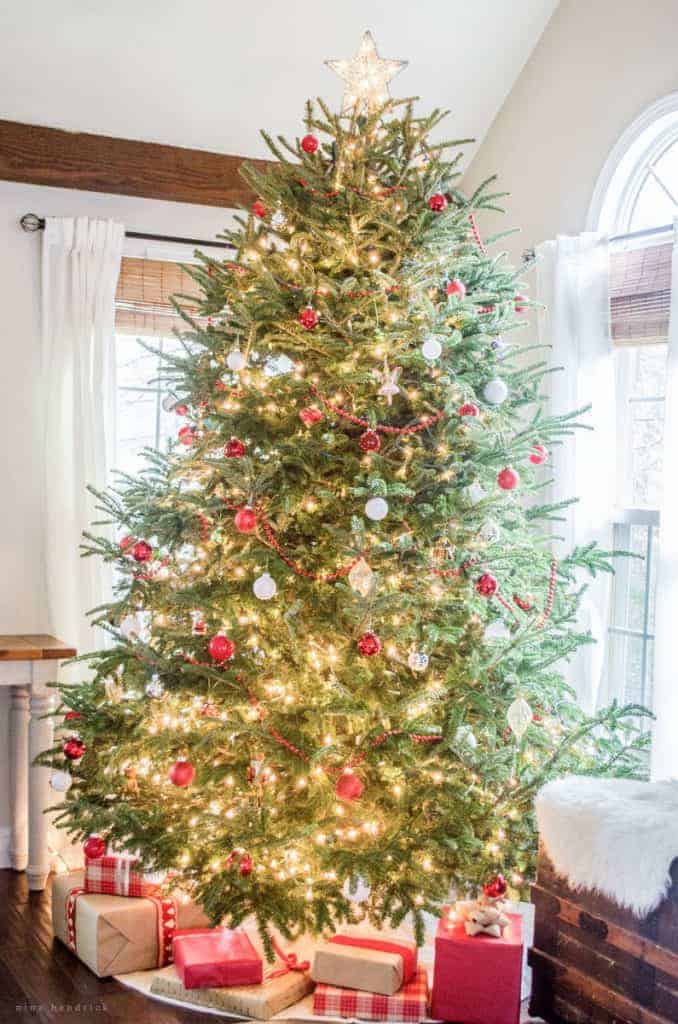 Gather holiday inspiration from this warm & cozy rustic farmhouse Christmas Home Tour. There are so many classic decor ideas!