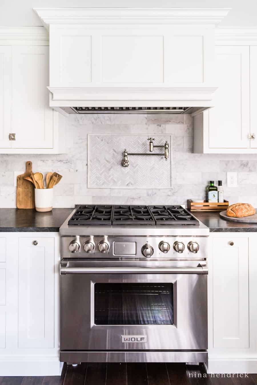 Wolf range with white cabinets — full kitchen makeover