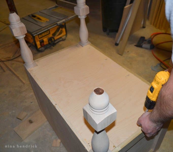 Attaching the bottom panel while building a bathroom vanity