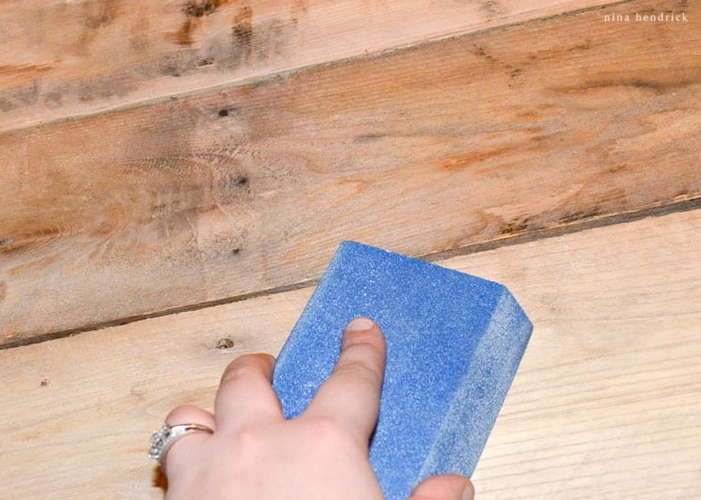 DIY Rustic Pallet Wood American Flag | Step Five: Lightly sand the roughest parts.
