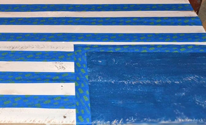 DIY Rustic Pallet Wood American Flag | Step Eight: Tape off to create the stripes.