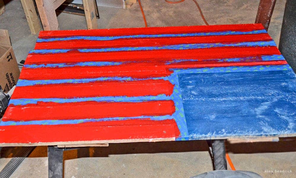 DIY Rustic Pallet Wood American Flag | Step Eight: Paint the stripes red.