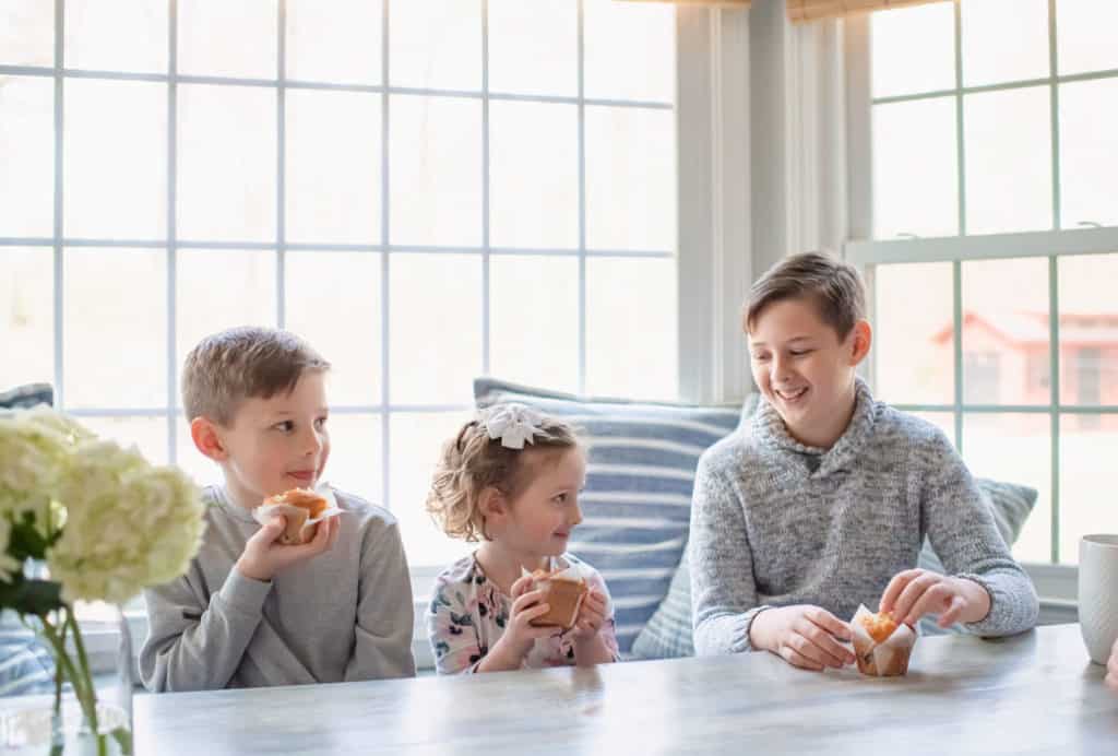 Kids eating breakfast in breakfast nook