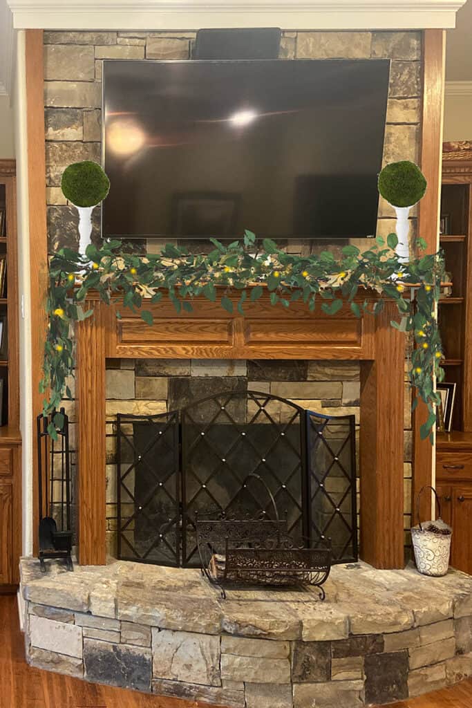 Decorating with TV above the mantel mockup