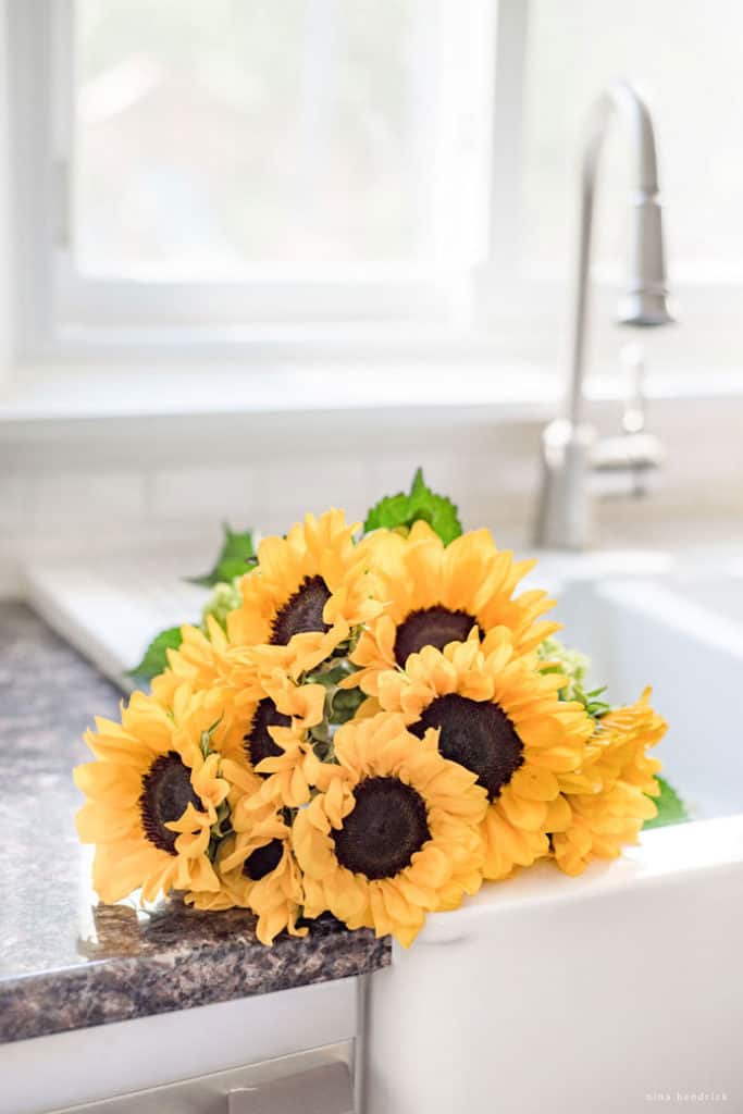 sunflowers in the sink