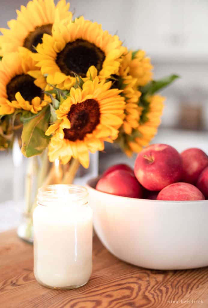 early fall kitchen sunflower and apple vignette