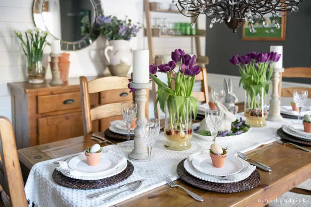 White and purple spring tablescape with dark, sculptural tulips
