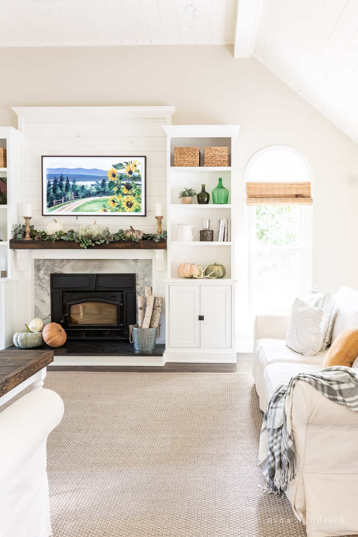 Fall mantel decor ideas including natural elements like pumpkins and greenery.