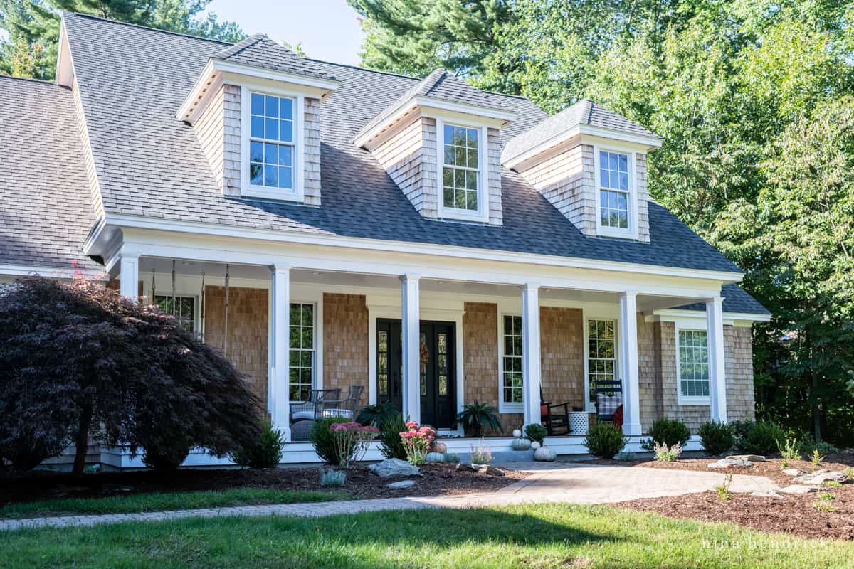 A home with a large front porch perfect for fall porch decor.