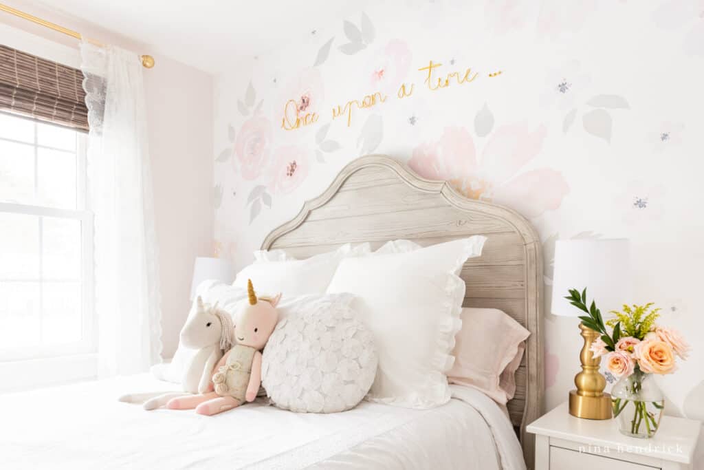 Fairy Tale Blush Floral Girl's room Makeover with stuffed animals and gold letters