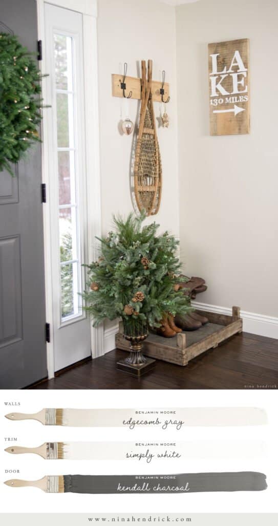 A neutral paint color scheme with Benjamin Moore Edgecomb Gray Foyer, Simply White trim, and a Kendall Charcoal door.