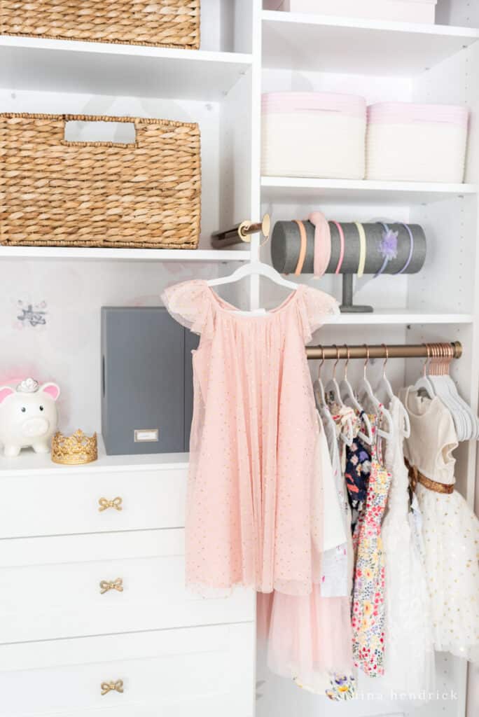 Girl organized closet with steaming hanger