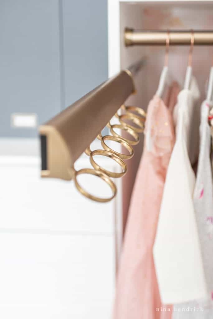 girl organized closet scarf hangers