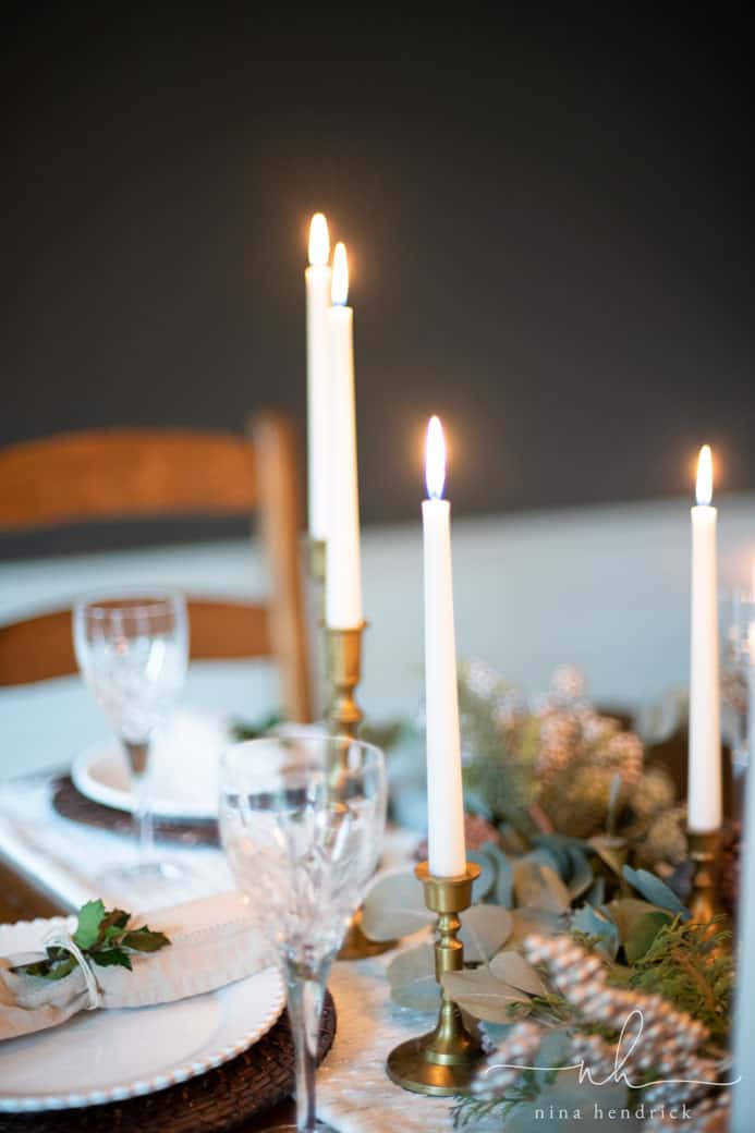 Green and Gold Christmas Tablescape | Host an elegant holiday meal by decorating with a green and gold Christmas tablescape.