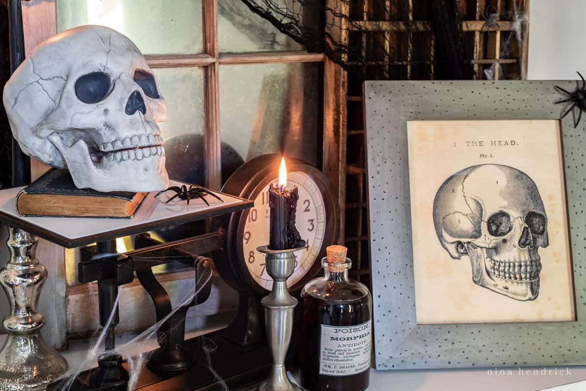 Looking for Halloween decorating ideas? Why not try adding a spooky touch to your mantle with a skull, candle, and bottle of wine?
