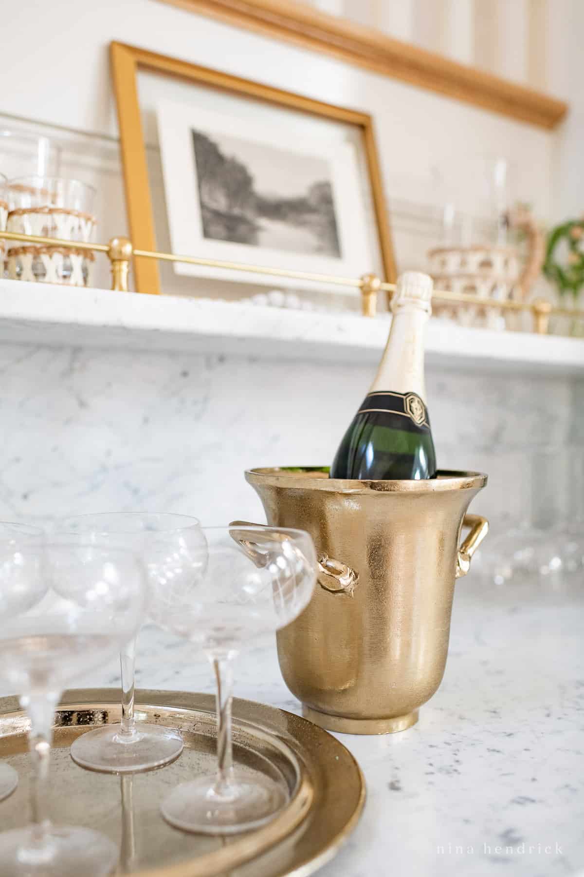 Rustic gold ice bucket with champagne