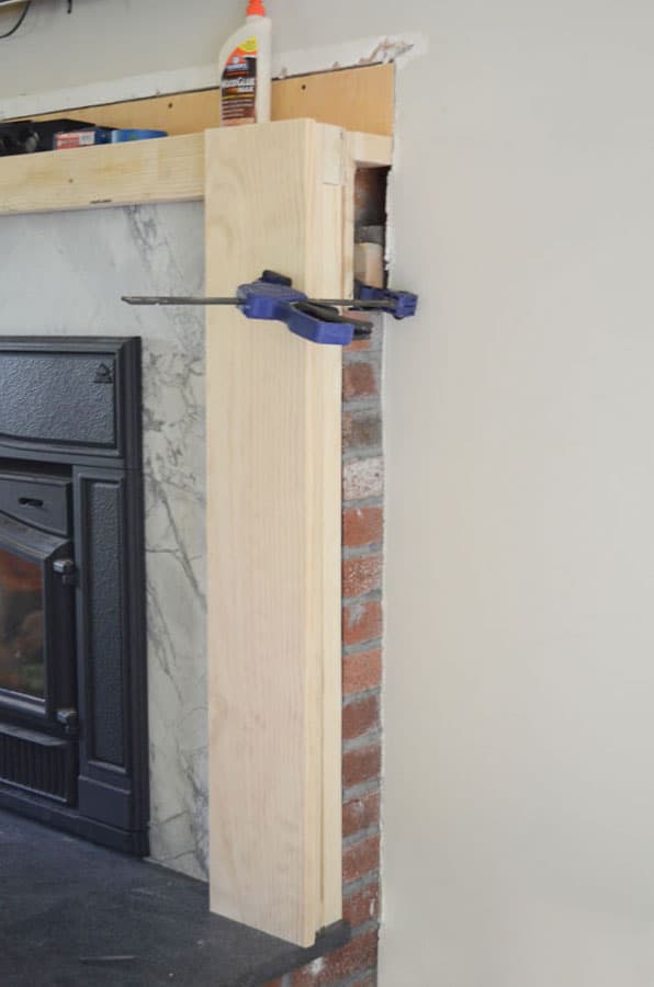 Wood framing to cover brick fireplace