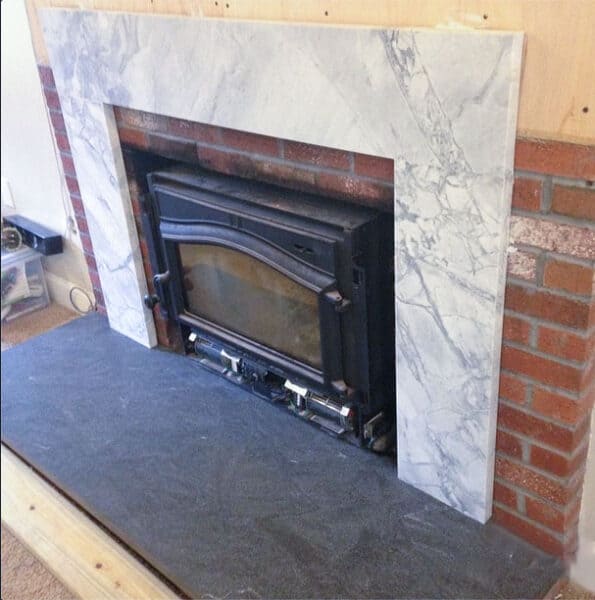 How To Cover a Brick Fireplace with Wood & Stone Nina Hendrick Home