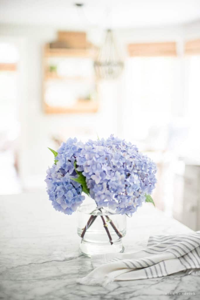 Hydrangeas in a bright white kitchen