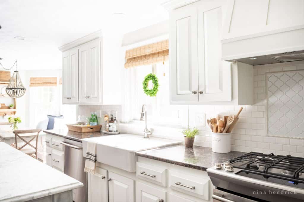 White kitchen with painted cabinets and a ton of natural light