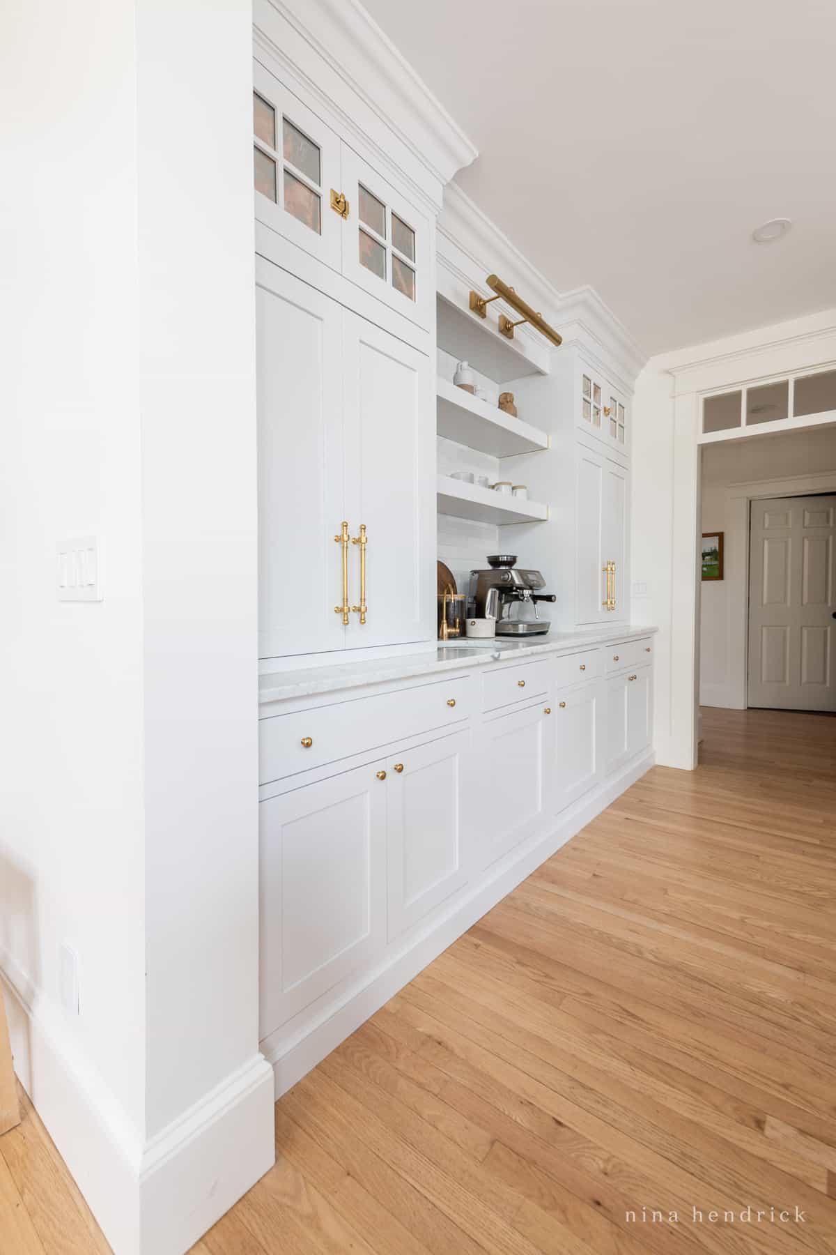 Kitchen coffee bar with library picture lighting 