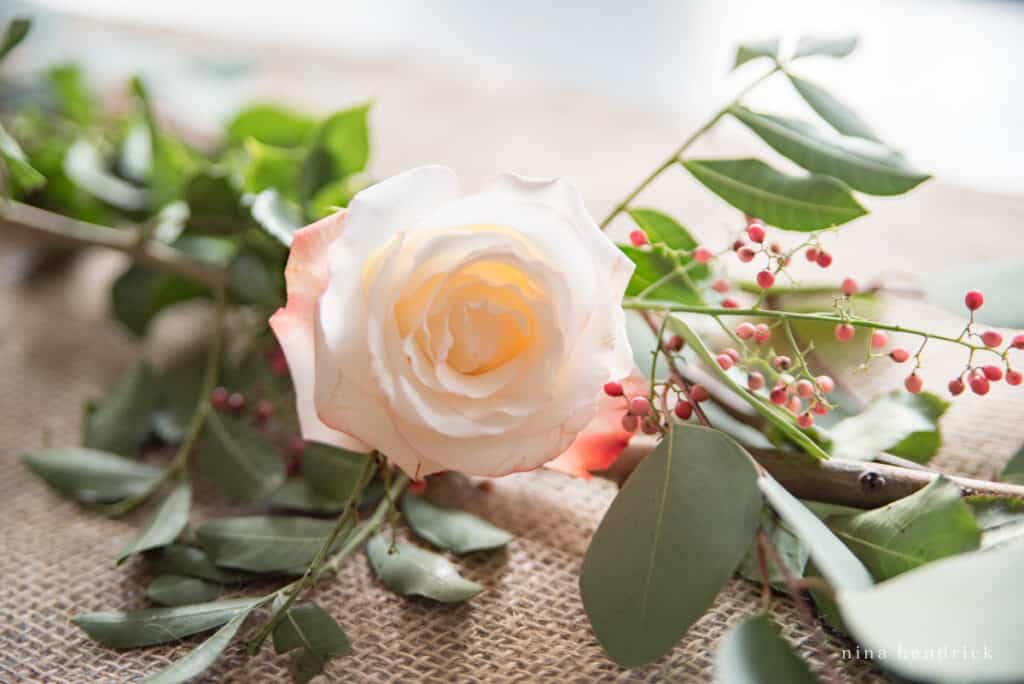 English rose and seeded eucalyptus centerpiece