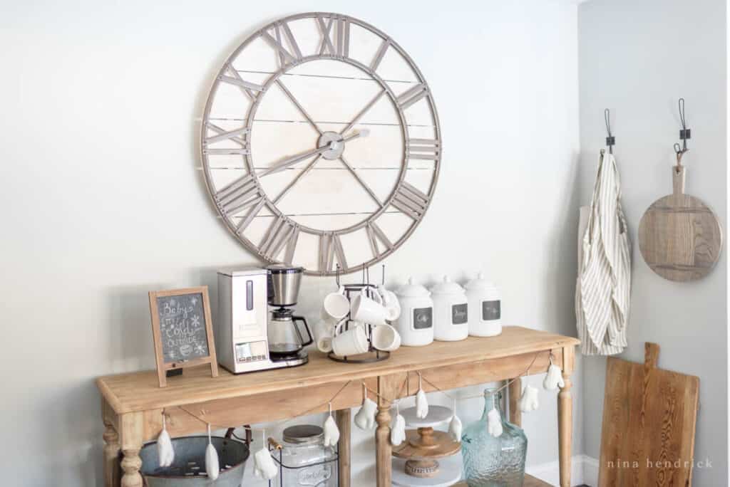Kitchen coffee station with white jars and wooden accents