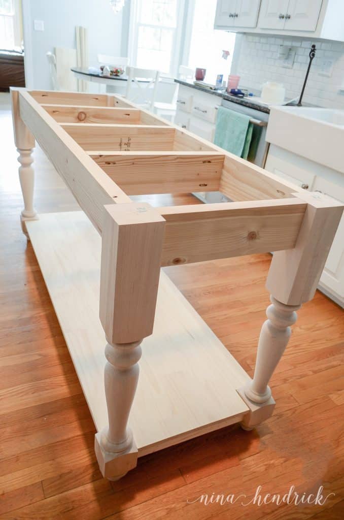 Building a DIY kitchen island with 2x6" lumber and turned legs