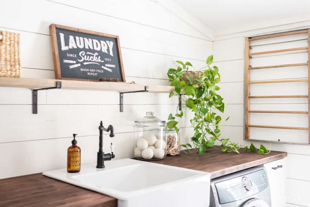 open shelving in the laundry room