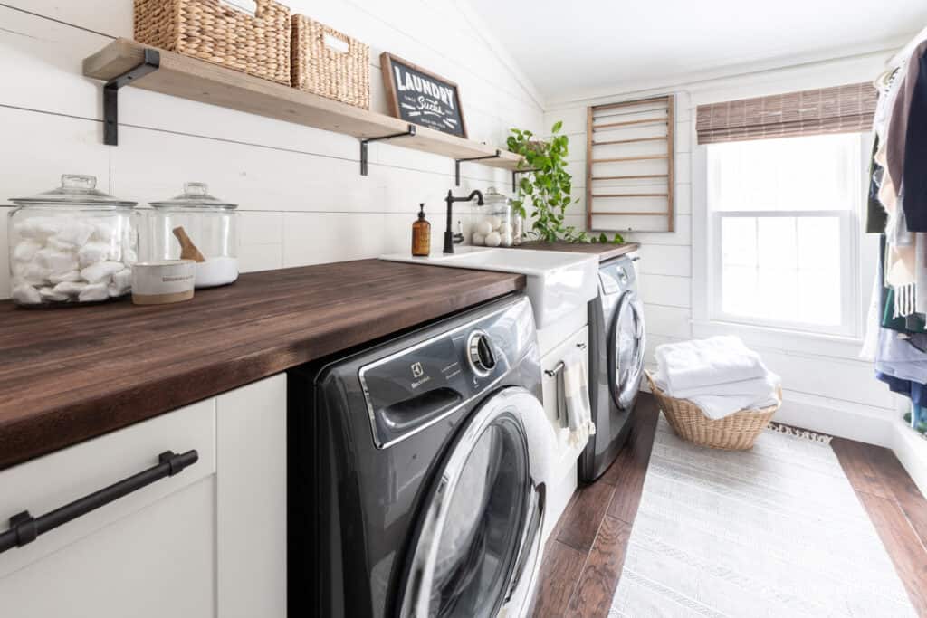 laundry room makeover that shares space with an organized woman's closet