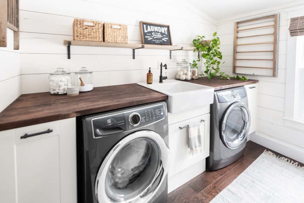 modern and fresh white laundry room makeover