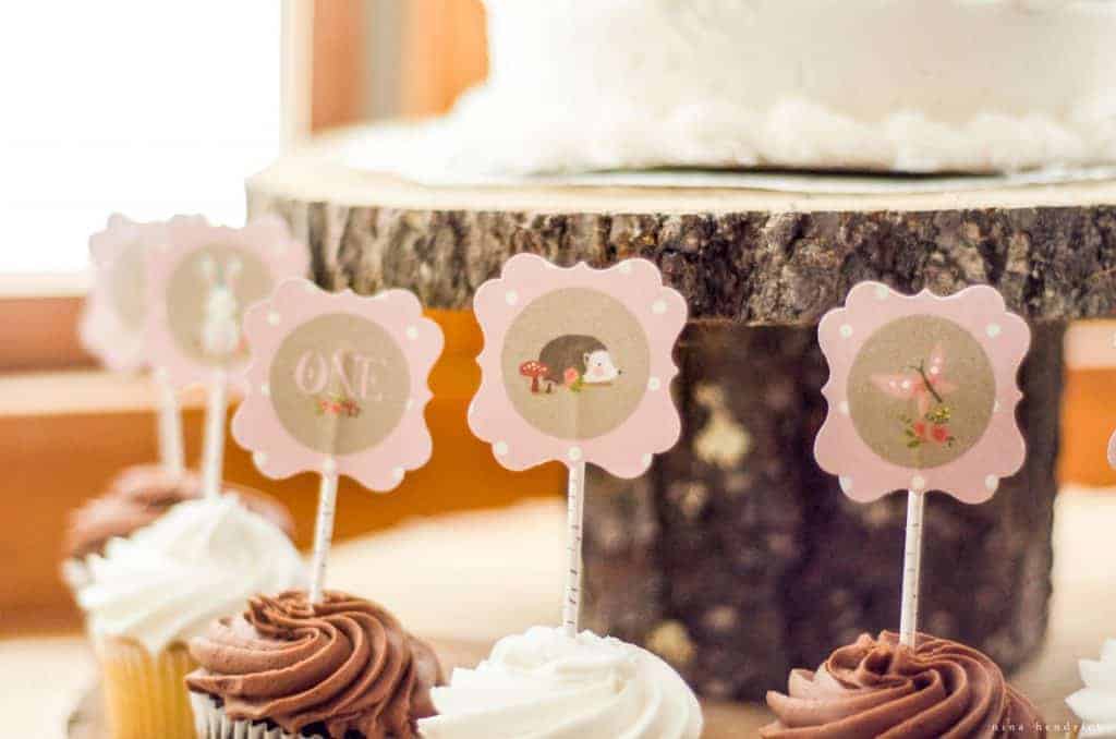 Gather inspiration from this sweet and simple woodland floral first birthday party. Inexpensive grocery store cake and flowers pair with handmade finds to create a unique event.
