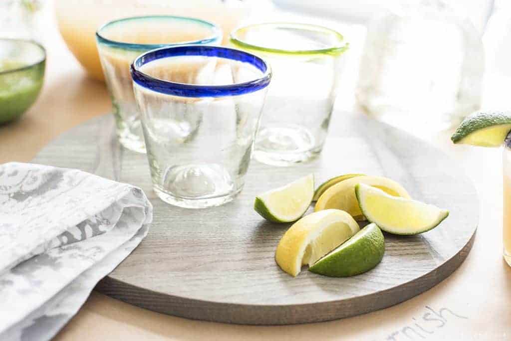 Margarita glasses and citrus wedges for Cinco de Mayo